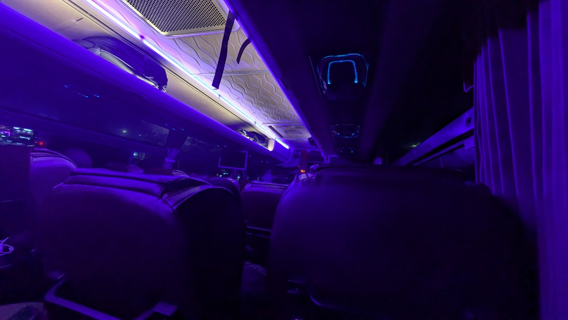 Inside the Trinity bus on the journey from Kigali to Kampala