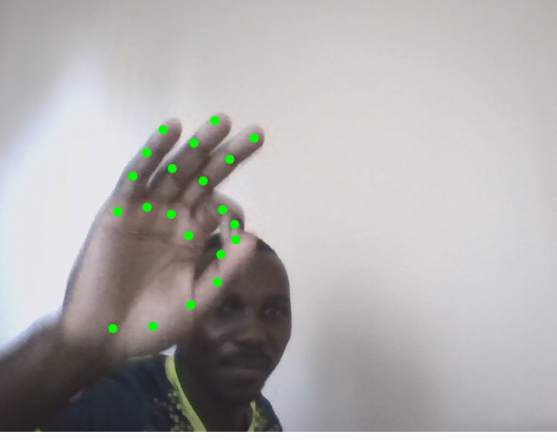 Denis Musinguzi testing hand gesture recognition with p5.js