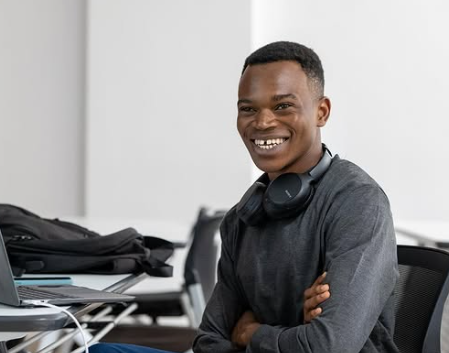 Jean de Dieu Nyandwi smiling as usual with arms folded